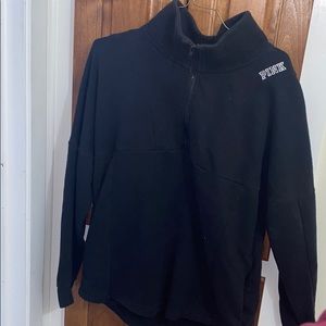 Black pullover by pink